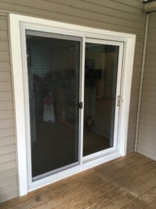Picture of the exterior of newly installed sliding glass patio doors.