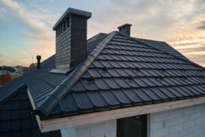 Picture of a steel shingle roof on a house.